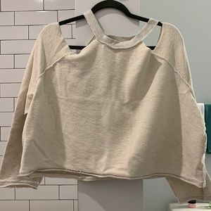 Sweater with cut outs